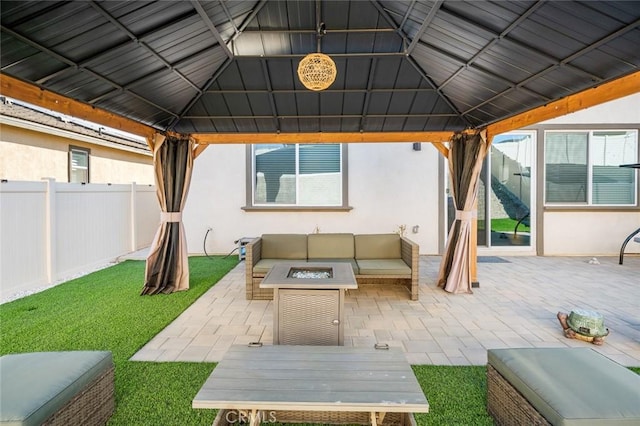 5097 Larkspur Rd, Banning, CA 92220 - view of patio with a gazebo and an outdoor living space with a fire pit