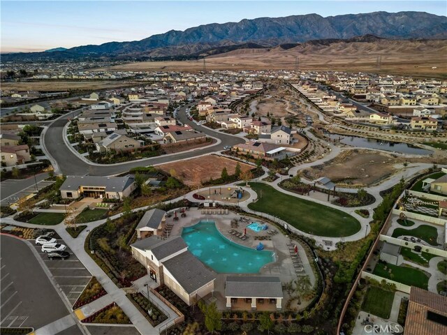 5097 Larkspur Rd, Banning, CA 92220 - aerial overview of property's location with nearby suburban area and a mountainous background