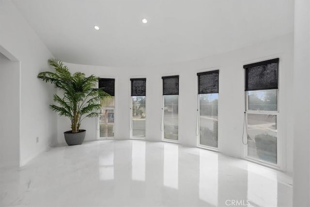 spare room featuring recessed lighting