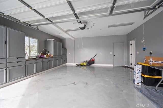 garage featuring a garage door opener