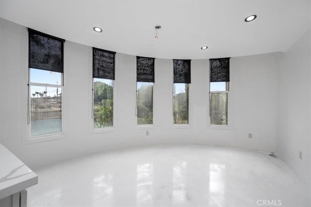 spare room featuring recessed lighting