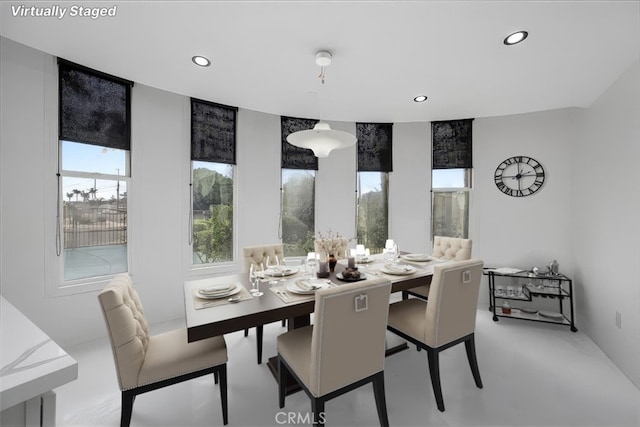 dining area featuring recessed lighting