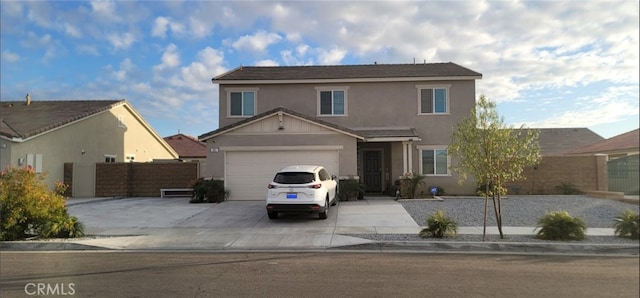 front of property with a garage