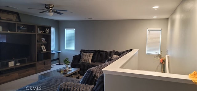 living room featuring ceiling fan