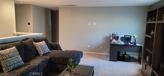 living room featuring light colored carpet