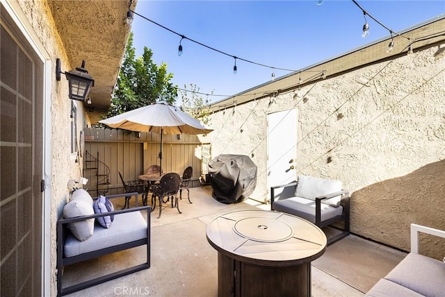 view of patio / terrace featuring a grill and an outdoor hangout area