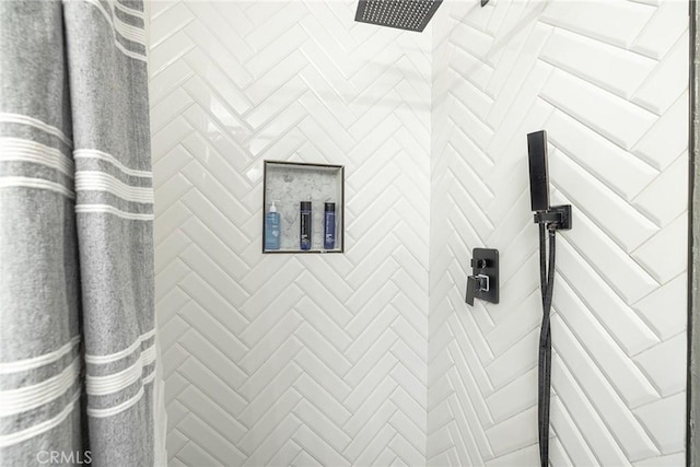 details with a tile shower