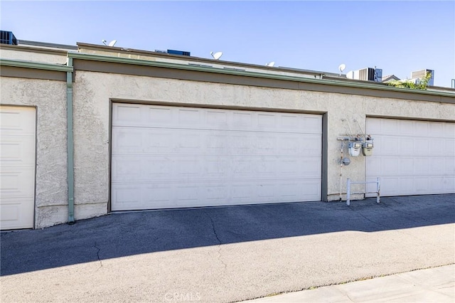 garage featuring cooling unit