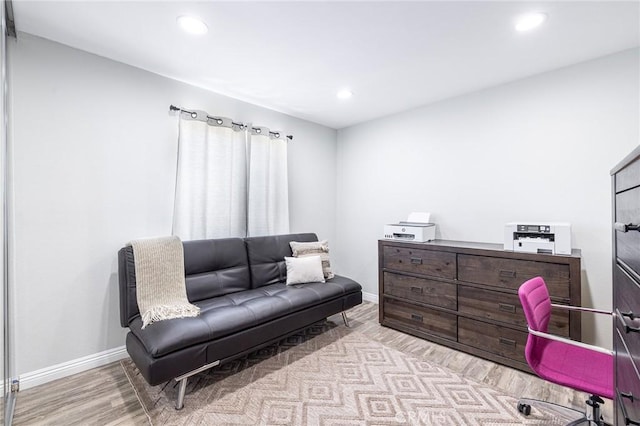 office area with light hardwood / wood-style flooring