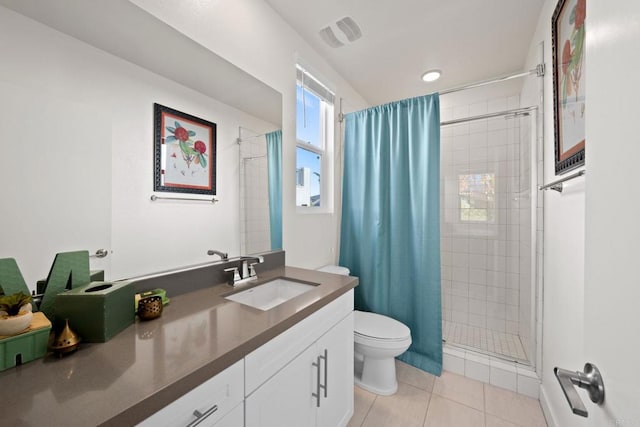 bathroom with tile patterned flooring, vanity, toilet, and a shower with shower curtain