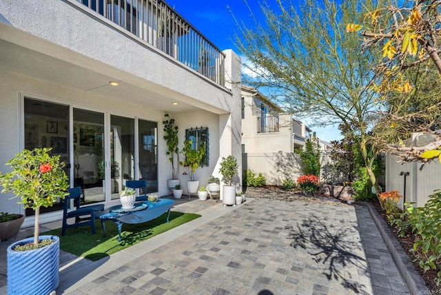 view of patio with a balcony