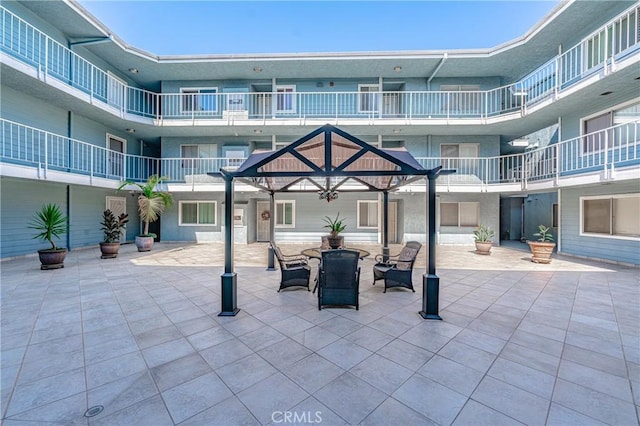surrounding community featuring a patio area