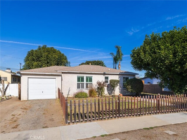 single story home with a garage