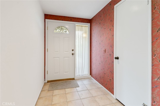 entryway featuring light tile patterned floors