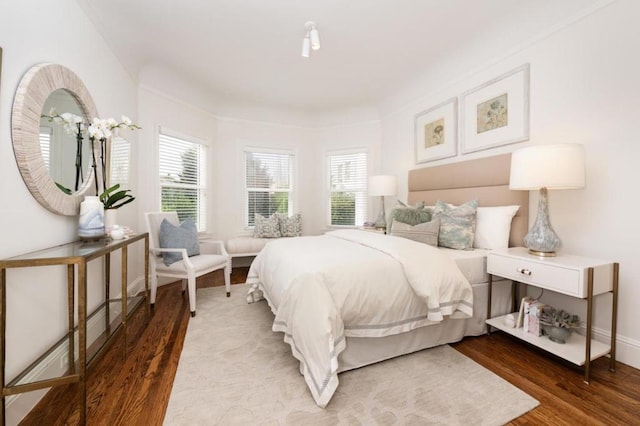 bedroom featuring hardwood / wood-style flooring