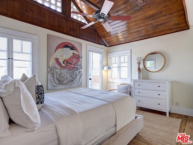 bedroom with ceiling fan, hardwood / wood-style flooring, multiple windows, and wooden ceiling