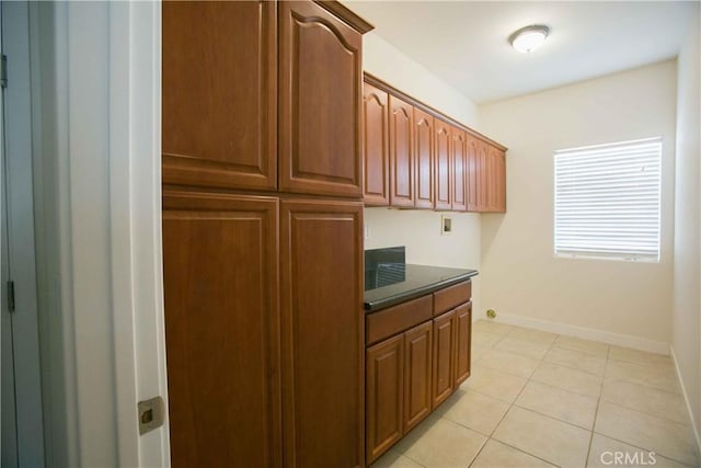 kitchen featuring light tile patterned flooring