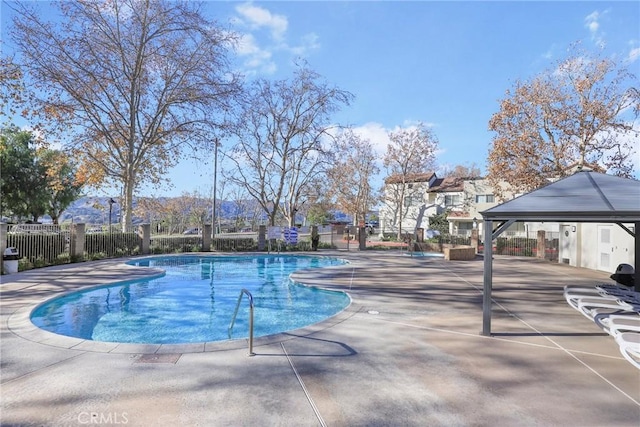 view of pool featuring a patio area and a gazebo