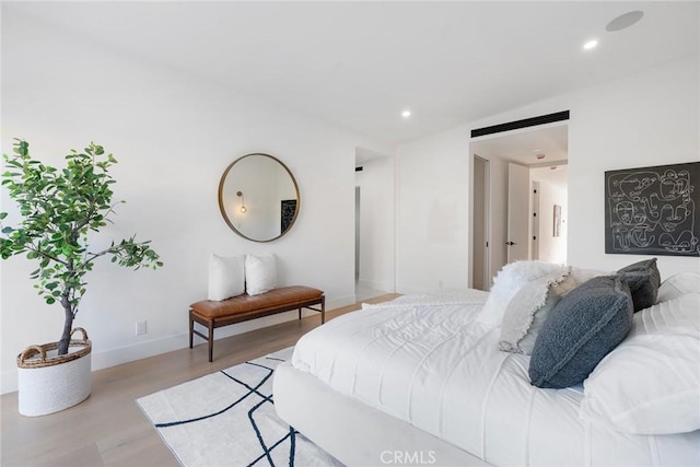 bedroom featuring light hardwood / wood-style floors