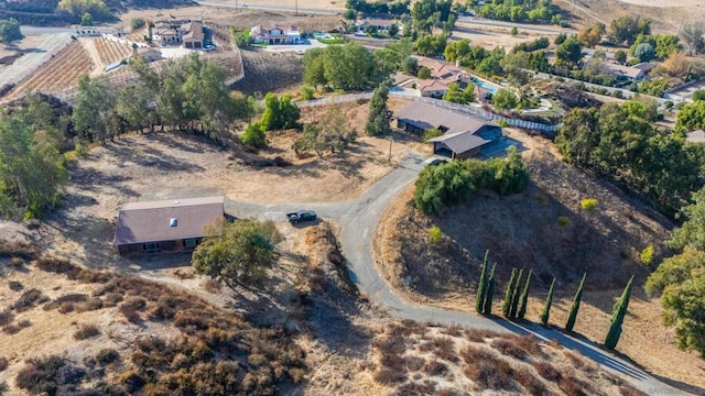 birds eye view of property featuring a rural view