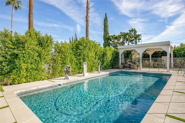 view of swimming pool featuring a patio