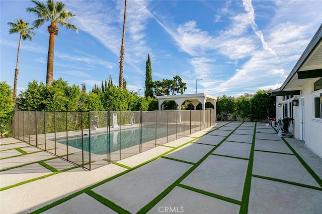 view of swimming pool featuring a patio