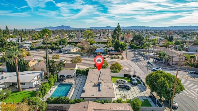 drone / aerial view featuring a mountain view