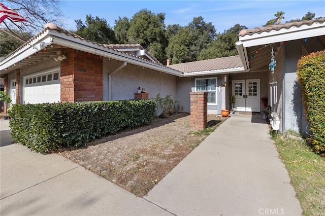 view of front of home featuring a garage