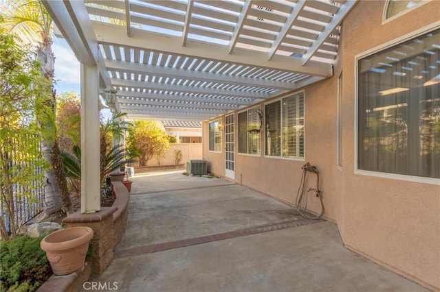 view of patio featuring central AC and a pergola