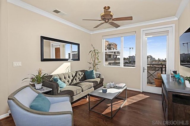 living room with ceiling fan, dark hardwood / wood-style flooring, and ornamental molding