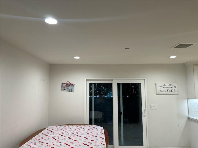 bedroom with visible vents and recessed lighting