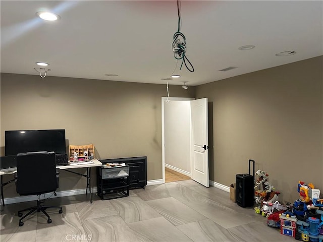 office space with baseboards, visible vents, and recessed lighting