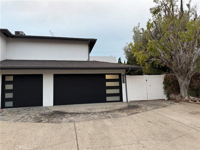 garage featuring a gate