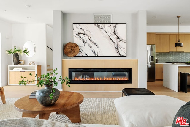 living room featuring light hardwood / wood-style flooring