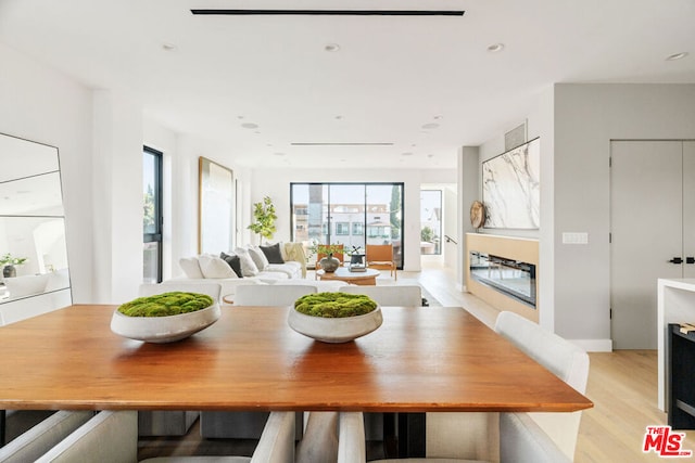 dining area featuring light hardwood / wood-style flooring