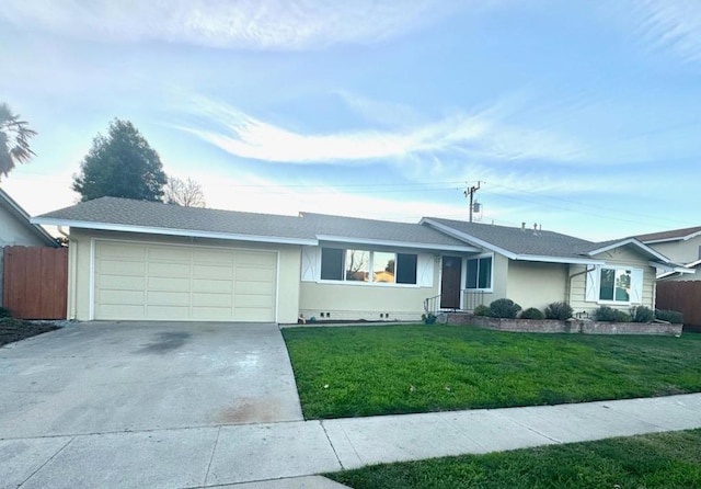 single story home with a garage and a front lawn