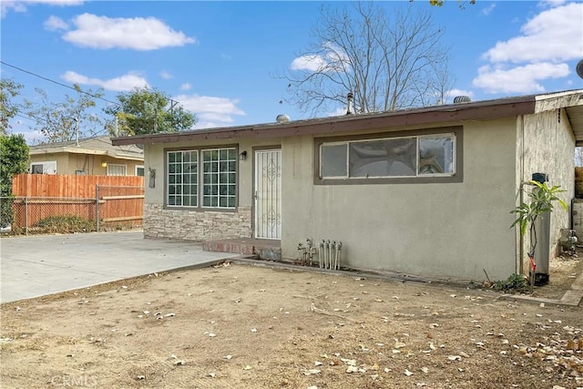 back of house featuring a patio