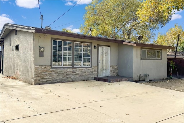 single story home with a patio