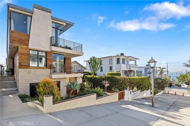 exterior space featuring stucco siding