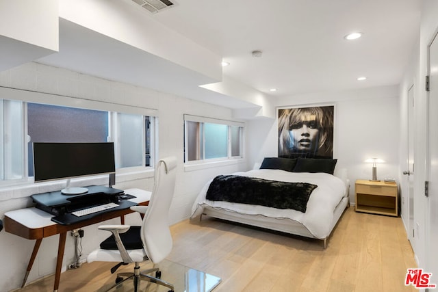 bedroom featuring light hardwood / wood-style flooring