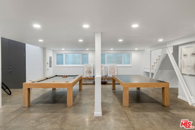 game room featuring concrete floors and billiards