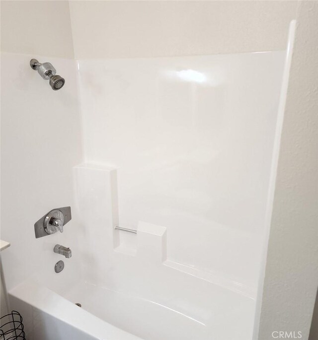 bathroom featuring shower / tub combination