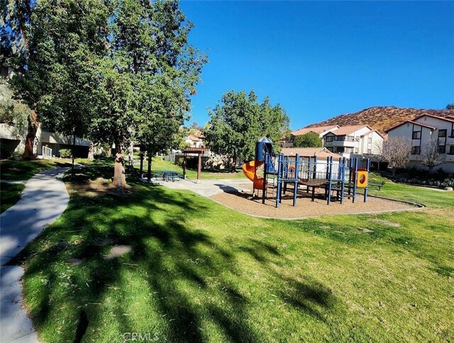 view of play area with a lawn