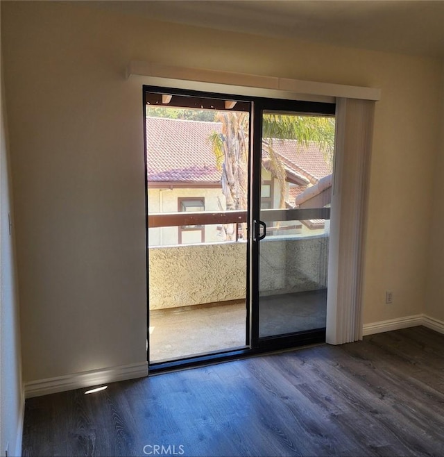 doorway to outside with hardwood / wood-style floors