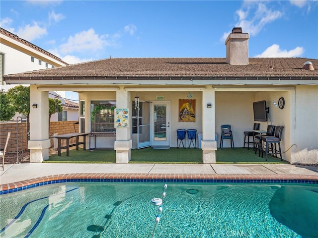 back of house featuring a patio area