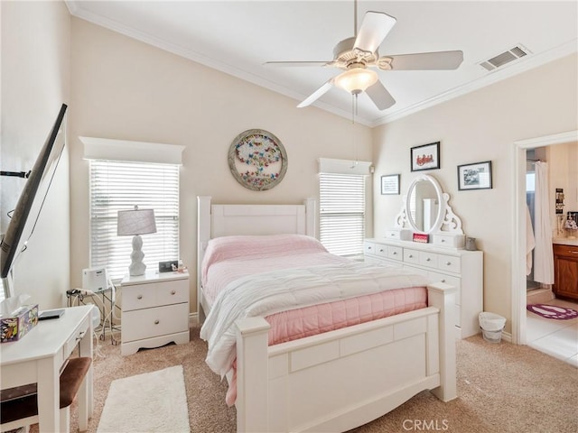 bedroom featuring ceiling fan, crown molding, and light carpet