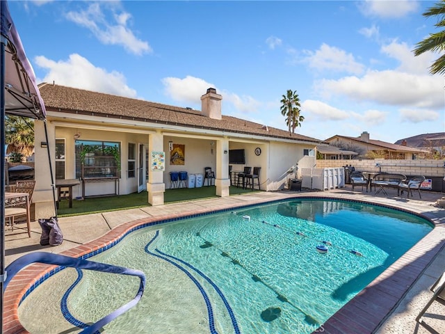 view of pool with a patio