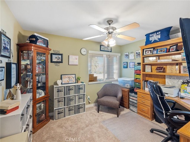 carpeted office with ceiling fan