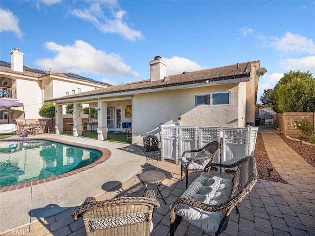 view of swimming pool featuring a patio