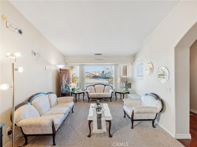 living room with vaulted ceiling